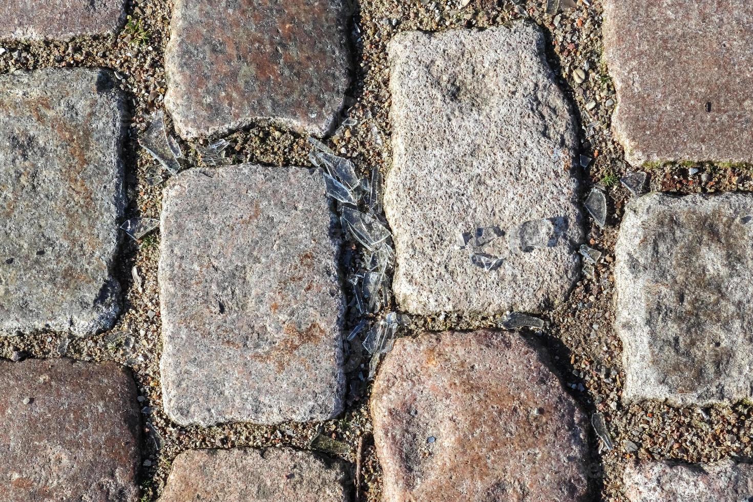 Detailed close up on old historical cobblestone roads and walkways photo