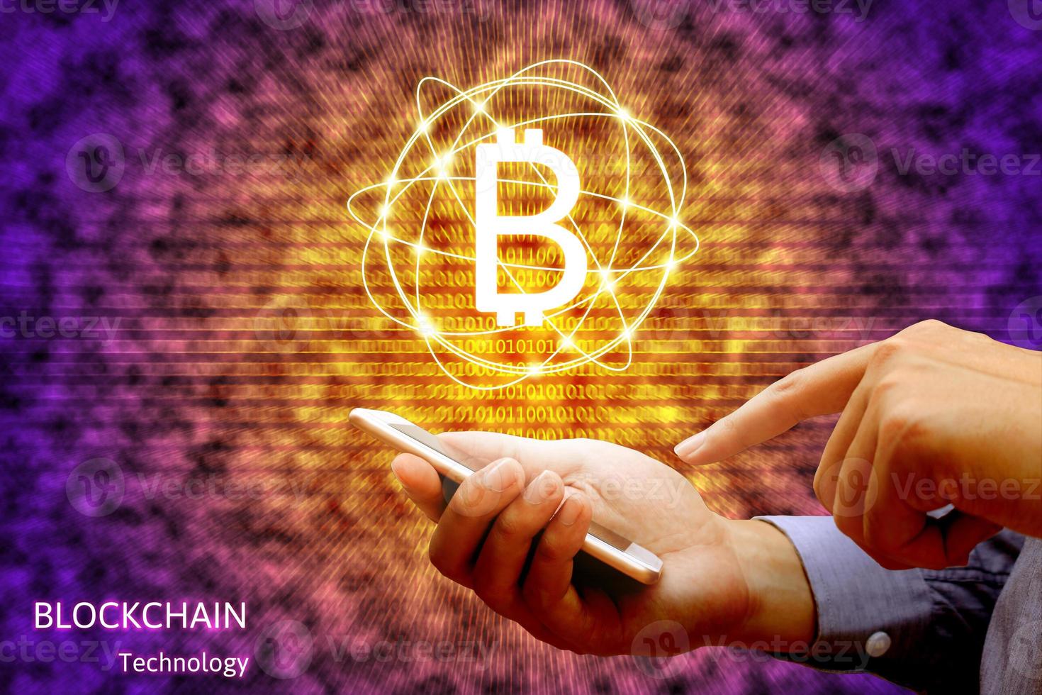 Blockchain technology concept, Businessman holding smartphone and virtual system diagram bitcoin. photo