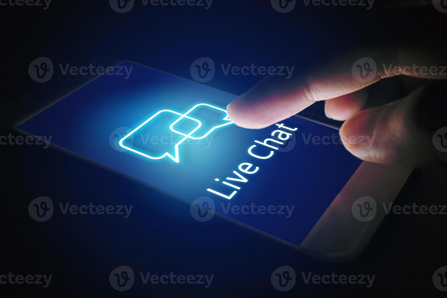 Live chat technology concept, woman hand pressing virtual screen on smartphone. photo
