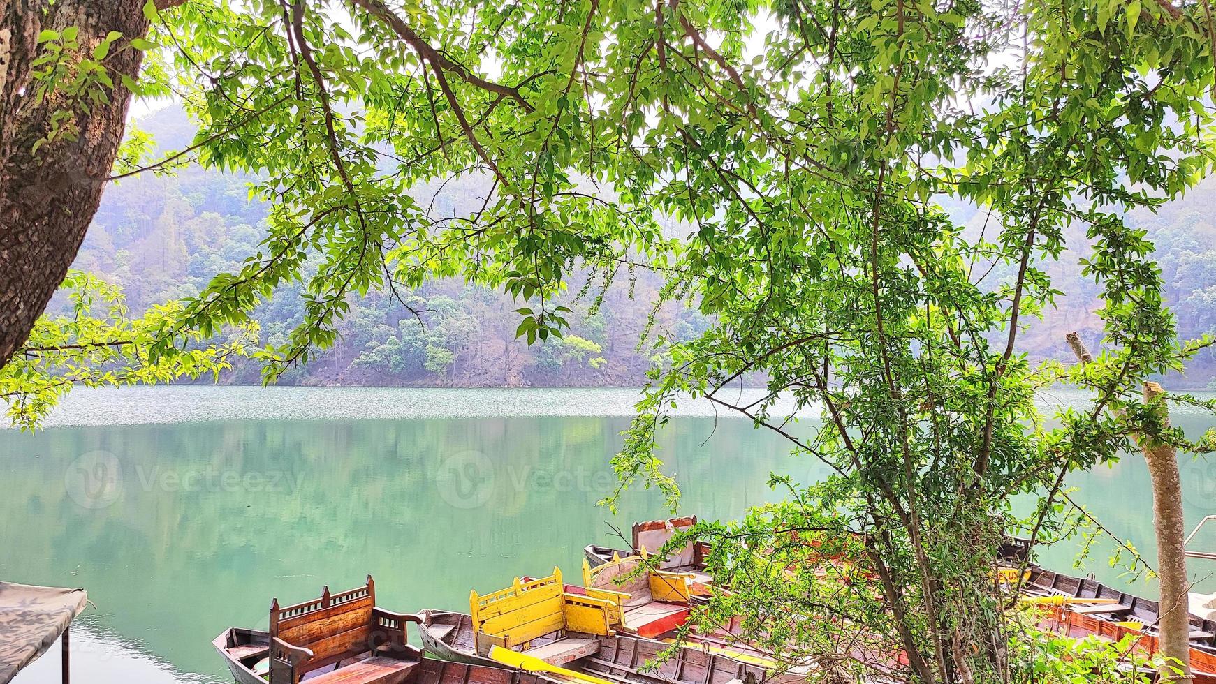 Boat hangered at Sat Tal - seven lakes - is an interconnected group of seven freshwater lakes situated in the Lower Himalayan Range near Bhimtal. photo
