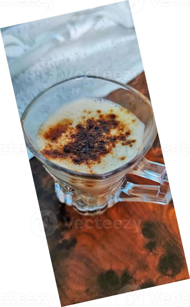 Hot coffee in white cup plate on dark background photo