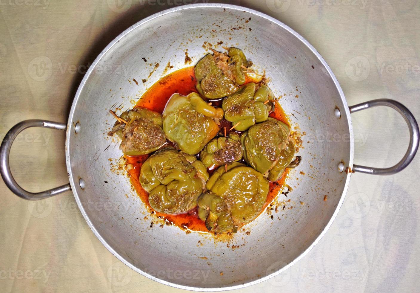 Stuffed spicy capsicum curry photo