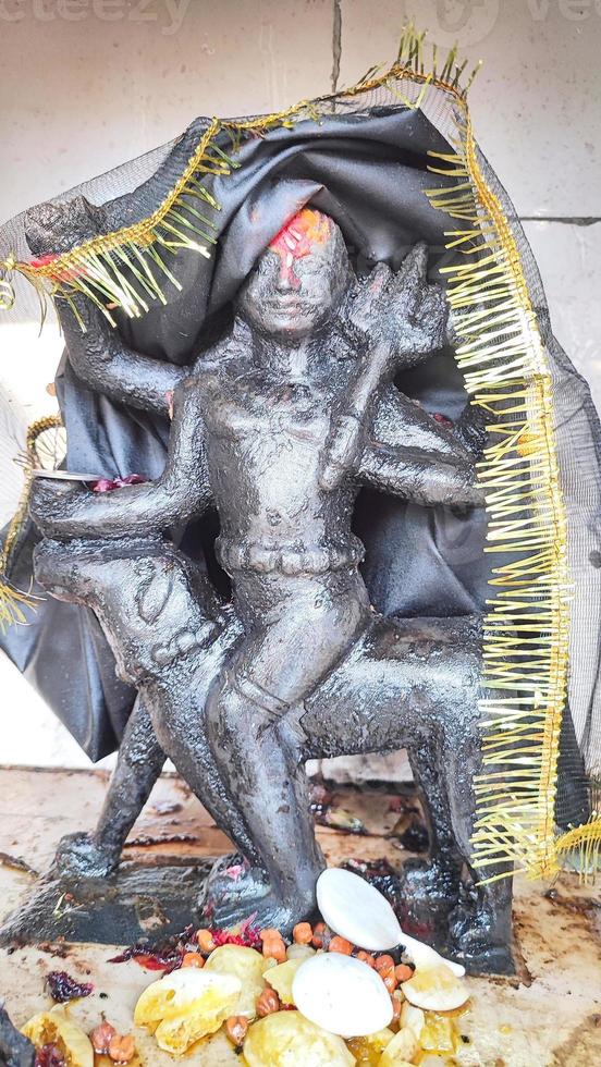 Idol of Shani Dev a Hindu God. photo