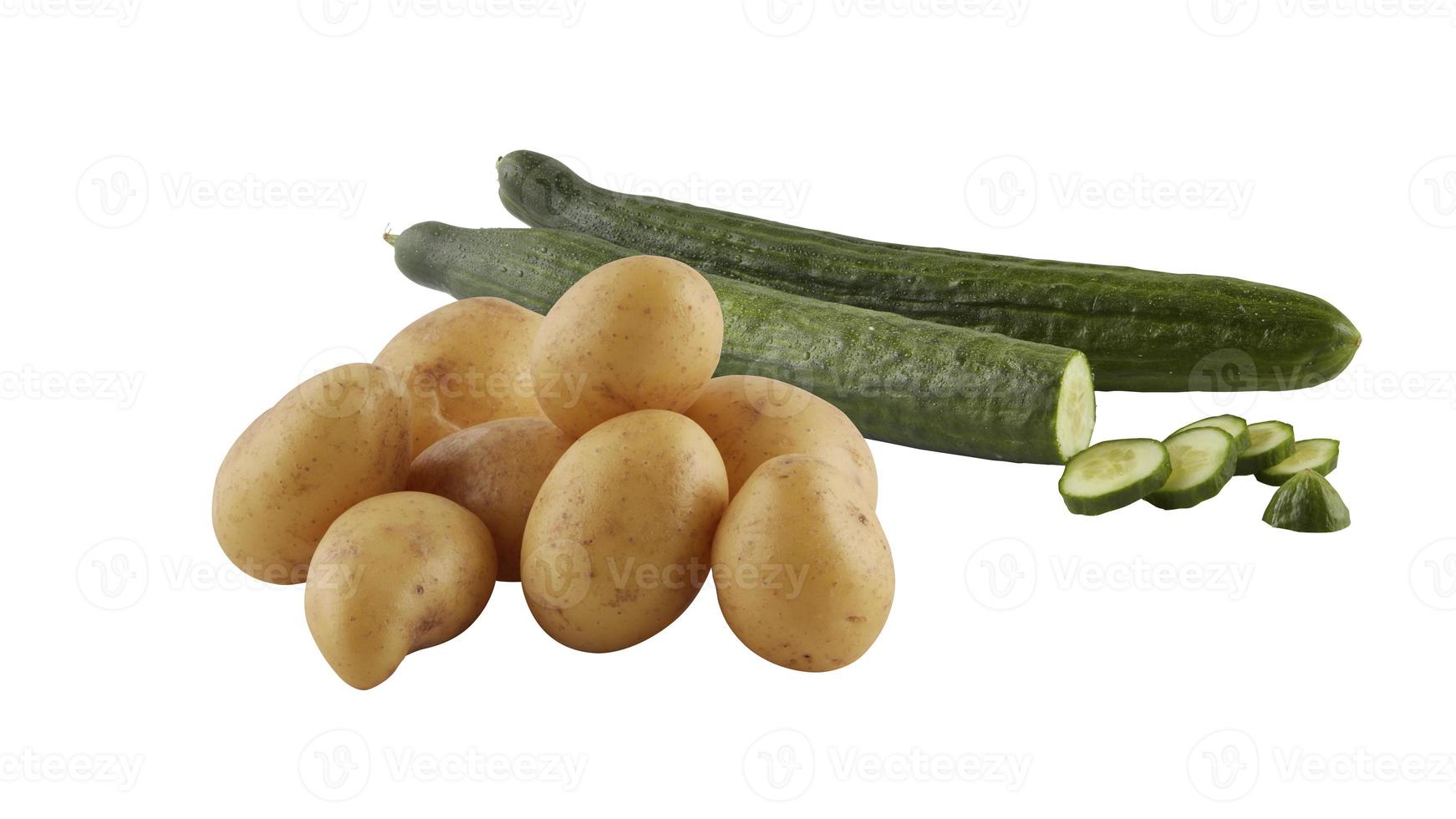 Sliced Potatoes and Cucumbers isolated on white background photo