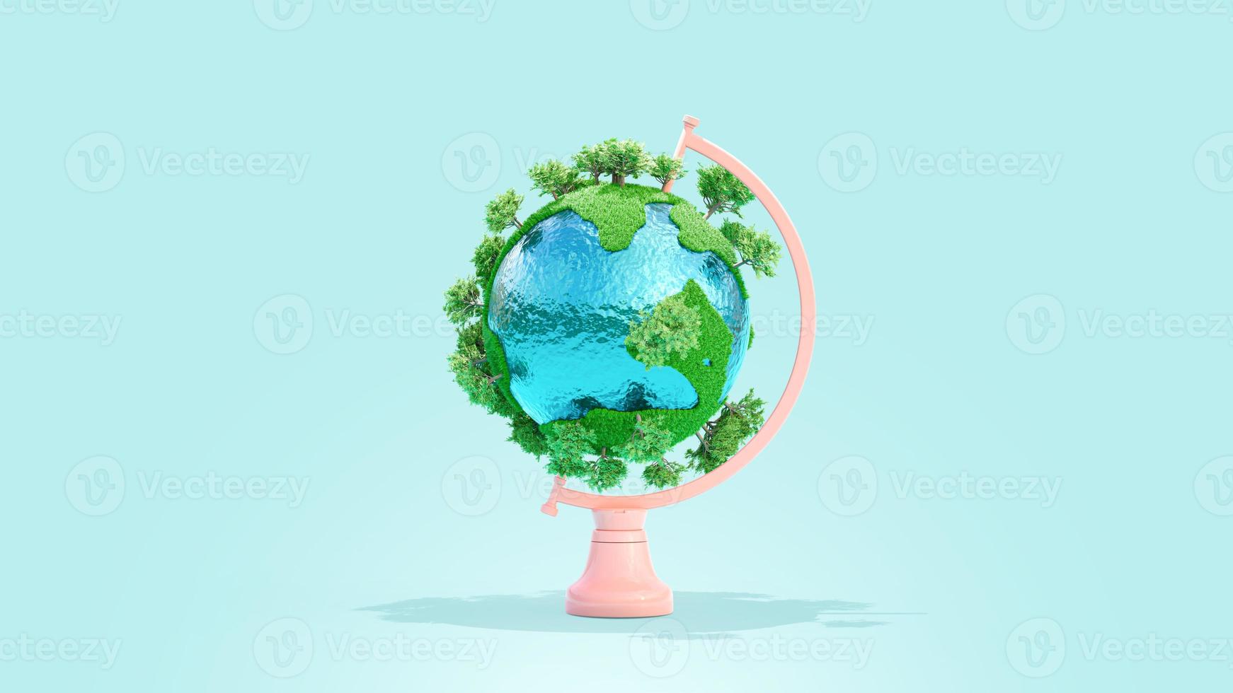 Globe full of grass and trees with light  top on rotating platform. photo