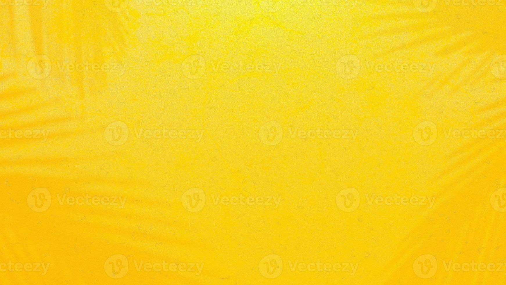 Yellow cement wall. Shadow from tree on cement floor. Minimal Background concept. photo