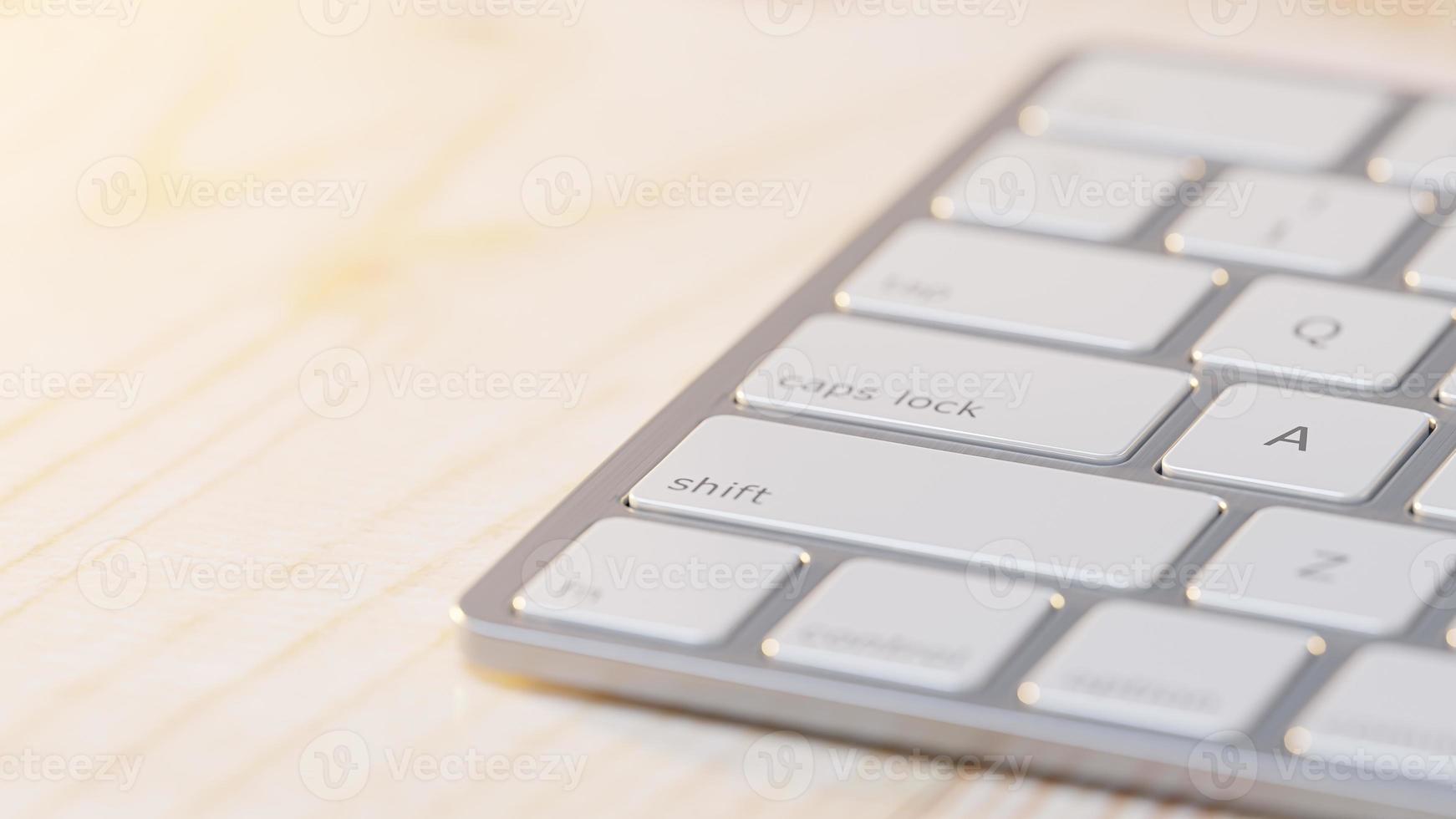 Close-up of keyboard placed on wooden table. Selective focus and Space for banner and logo. photo