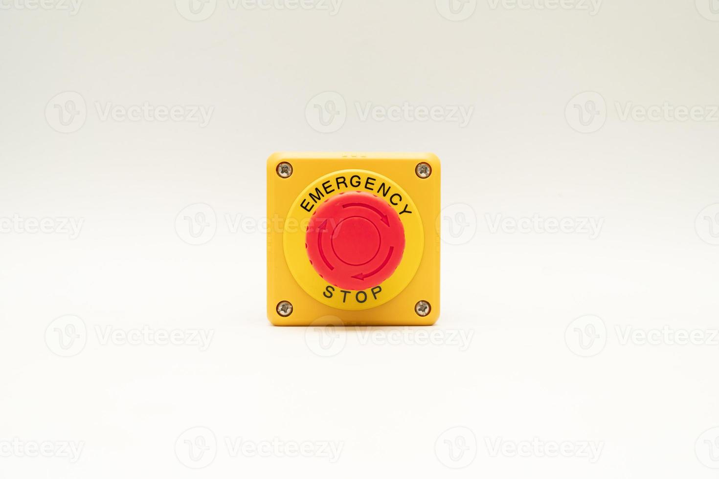Stop Button and the Hand of Worker About to Press it. emergency stop button. Big Red emergency button or stop button for manual pressing. photo