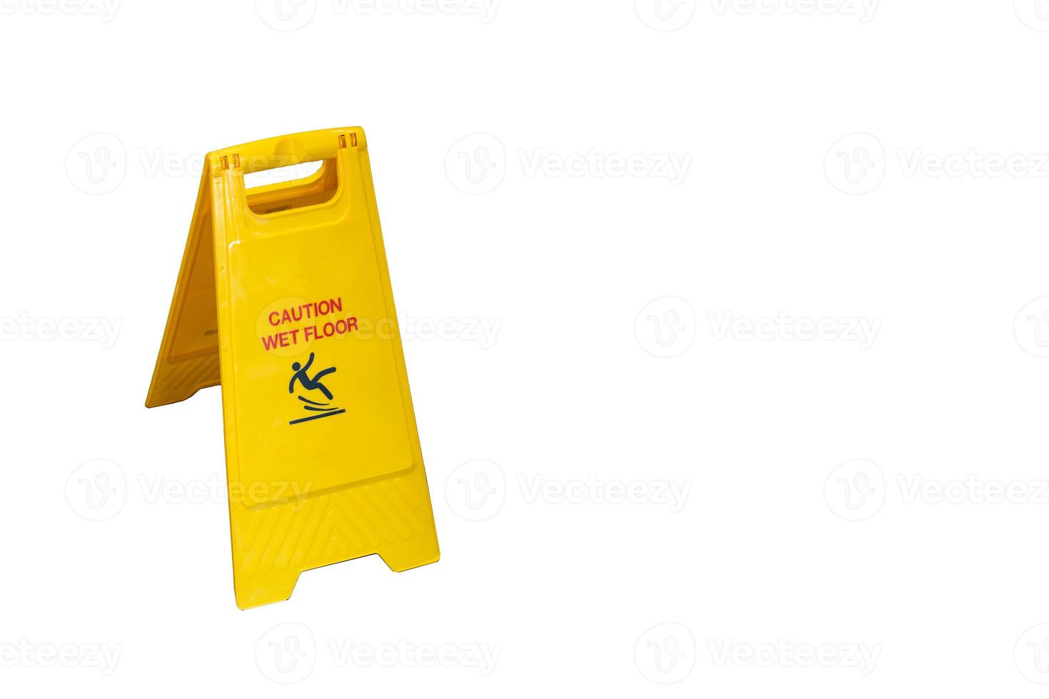 Yellow Caution slippery wet floor sign. Wet floor caution sign on walkway. Warning yellow plastic caution wet floor sign, isolated on white background photo