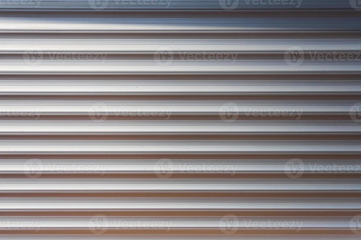 Close-up silver metal profile of an industrial building photo