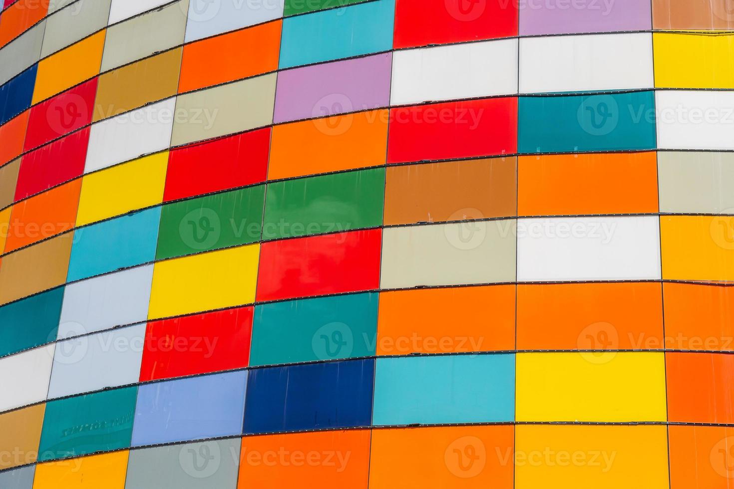 Close-up of a multi-colored wall of squares at the mall photo