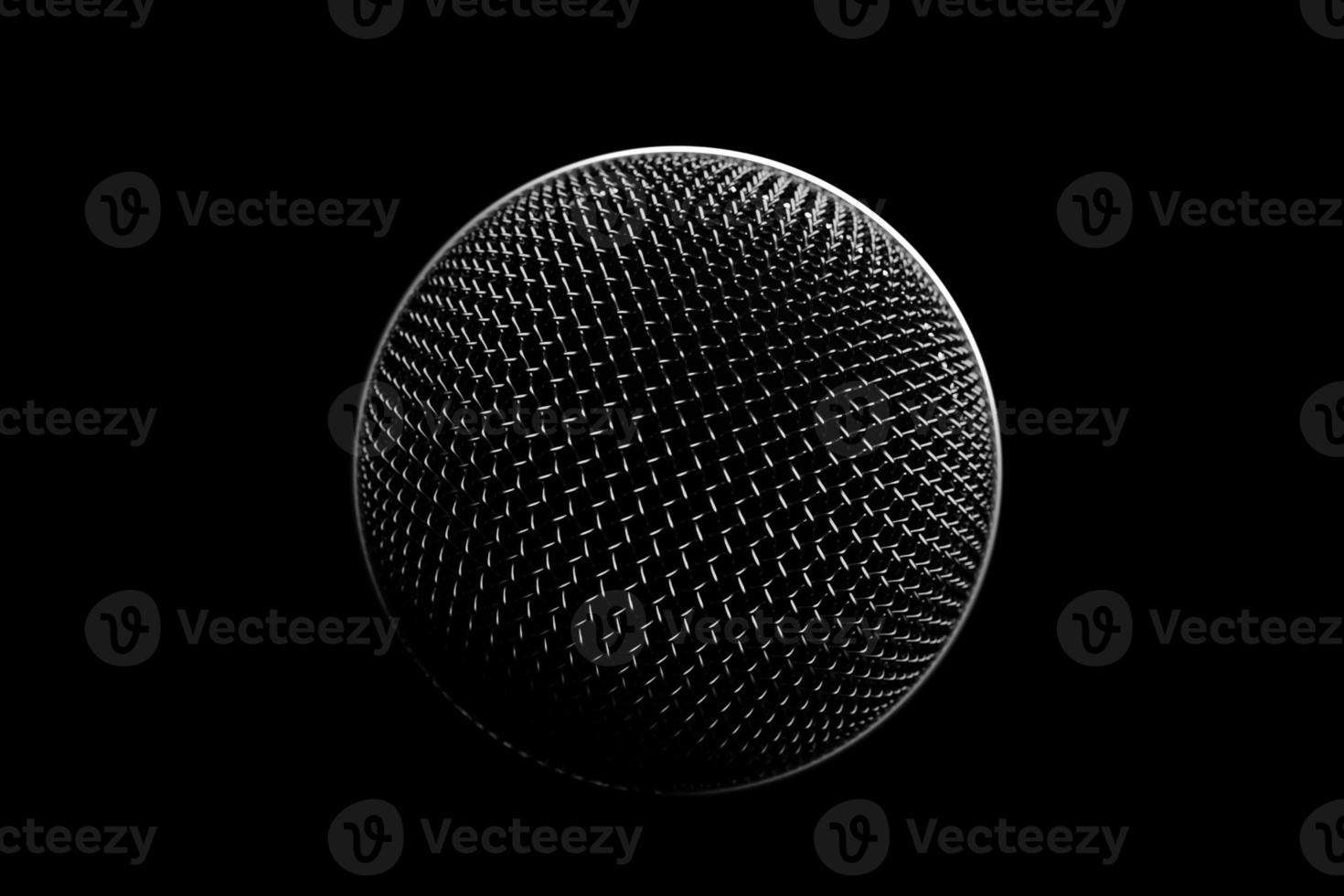 3d illustration close up of a metal microphone on a black background photo