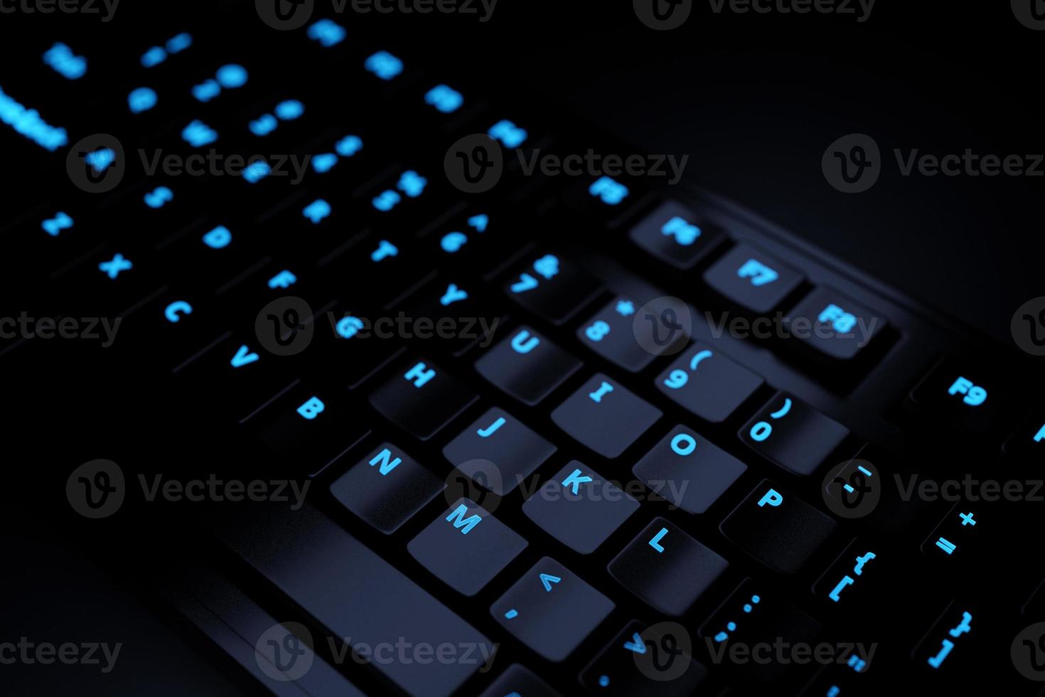 3d illustration, close up of the realistic computer or laptop keyboard  on black background .  Gaming keyboard with LED backlit photo