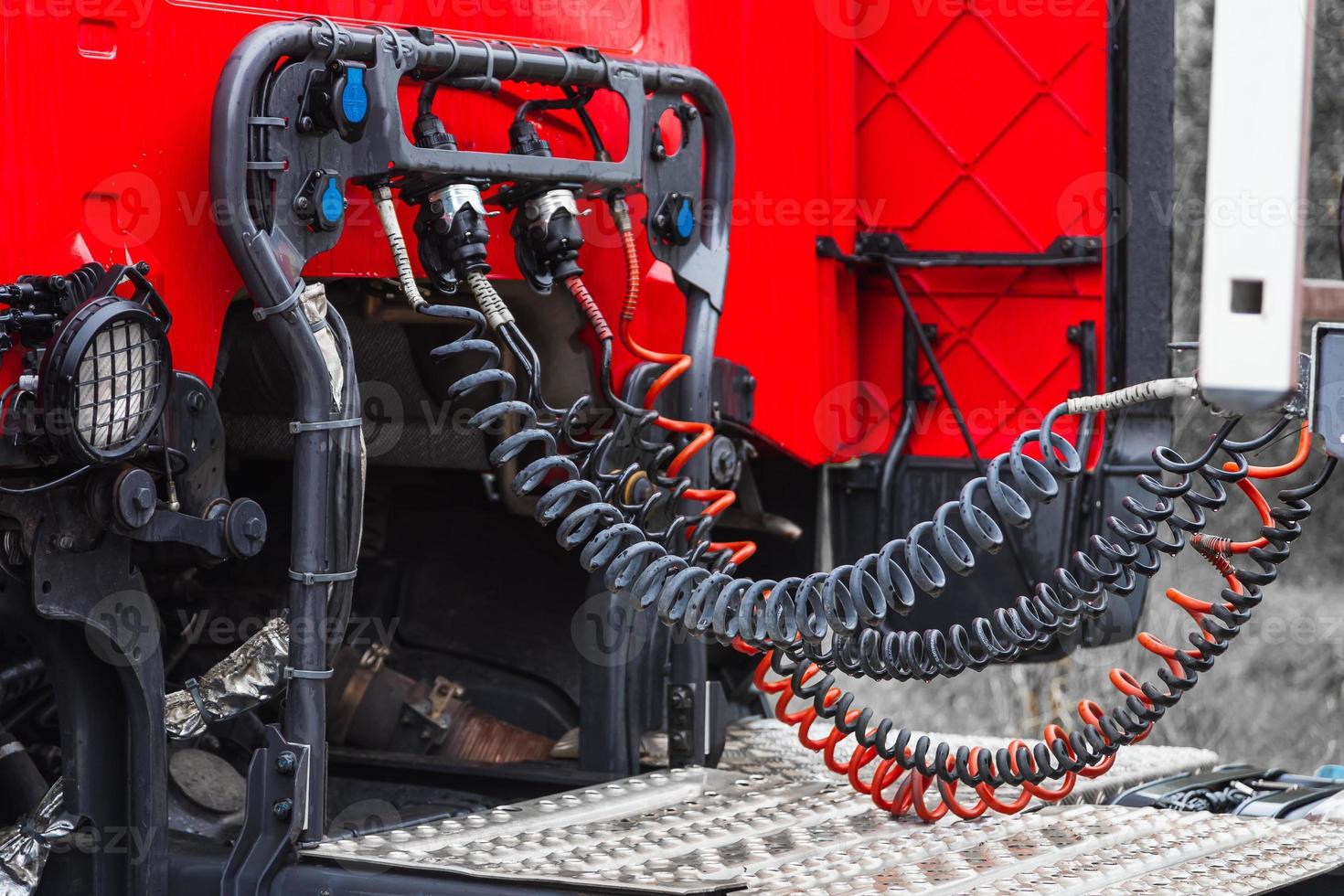 Close-up of the rear of the red cab of the truck photo