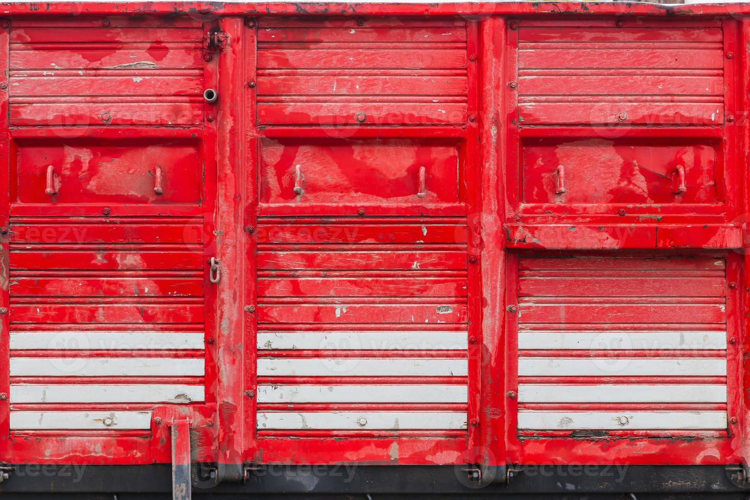 close-up of an old wooden truck body with hooks photo