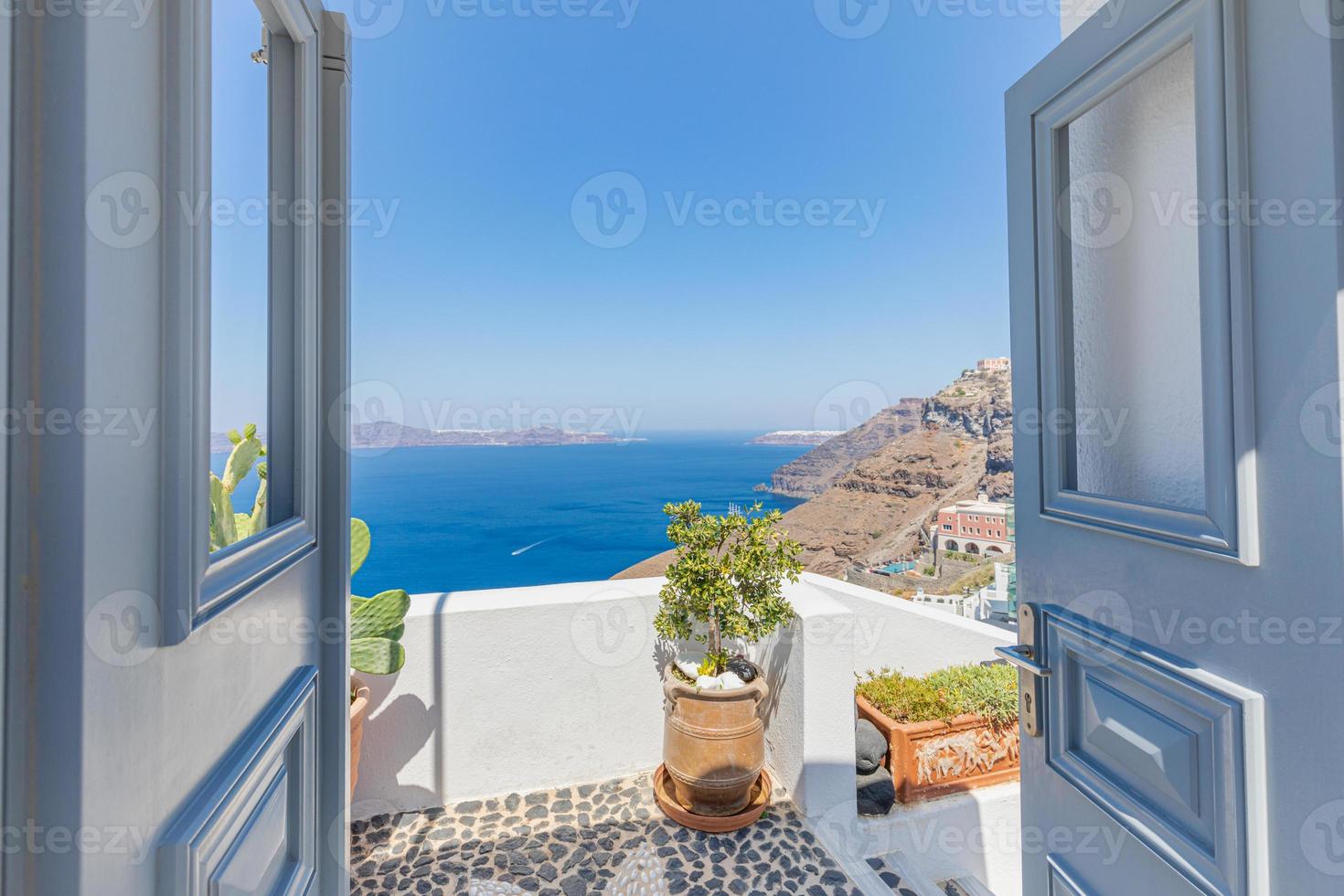 Fantastic travel background, Santorini urban street landscape. Blue door or gate stairs and white architecture under sunny sky. Amazing summer vacation holiday adventure. Wonderful summer luxury vibes photo