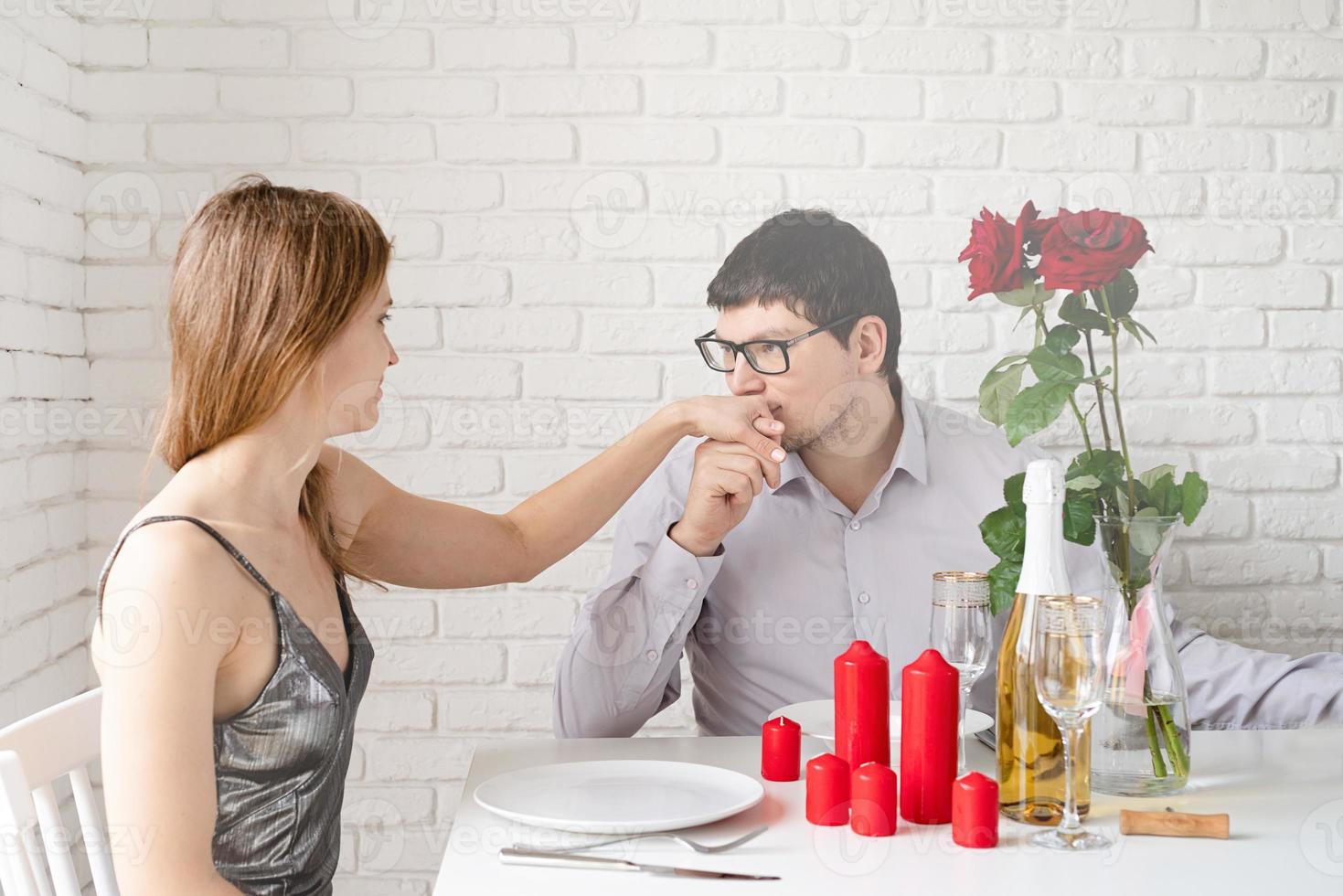 romantic date. Couple in love having romantic date at home photo