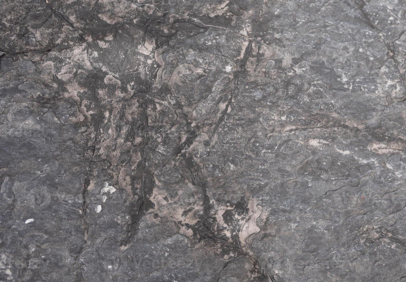 Abstract background and textures of dark gray stone photo