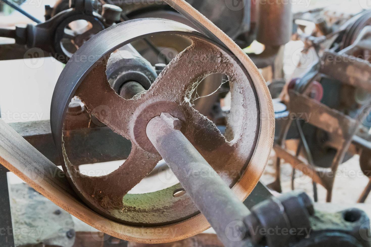 old pulley machine with belt photo