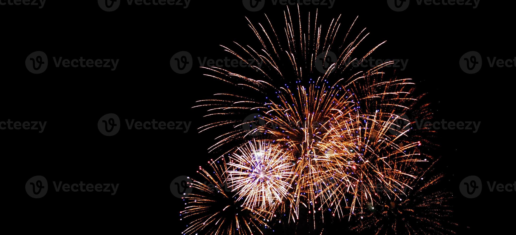 Bokeh with blurred beautiful fireworks sparkle full sky photo