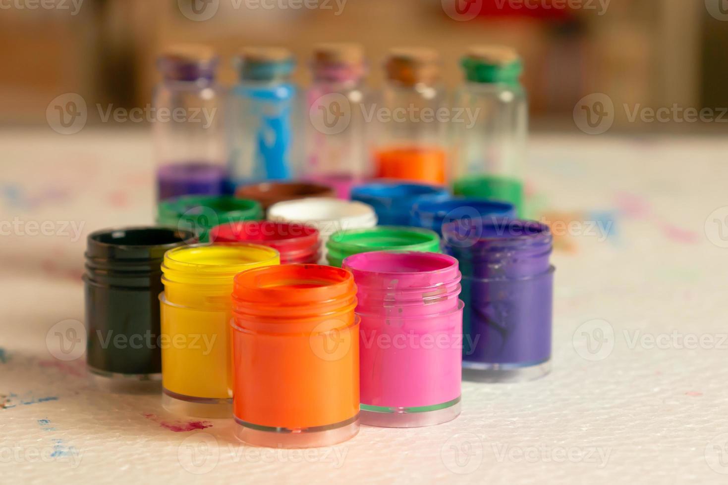 Color bottles on the white foam pad photo