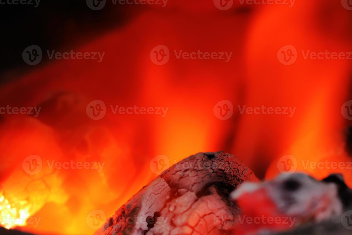 Background of hot coals in the fire photo