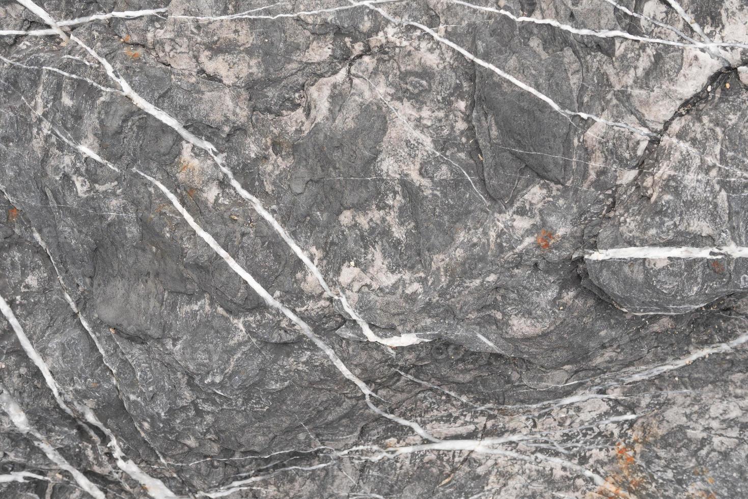 background and texture of black stone and white line photo