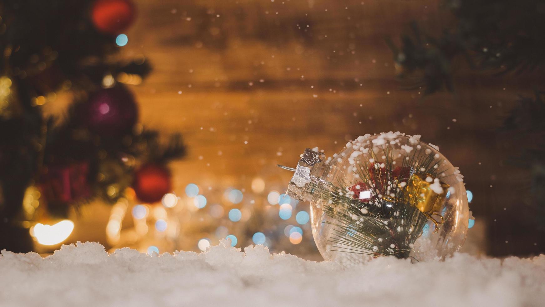 Christmas tree decorated background with snow and bokeh, Christmas and New Year holidays. photo