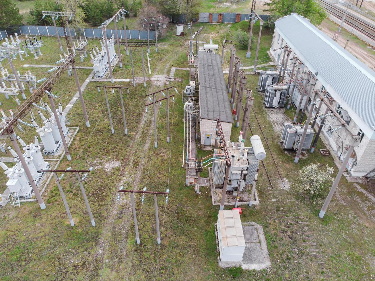 Aerial view of old rural high-voltage electrical railways substation. photo