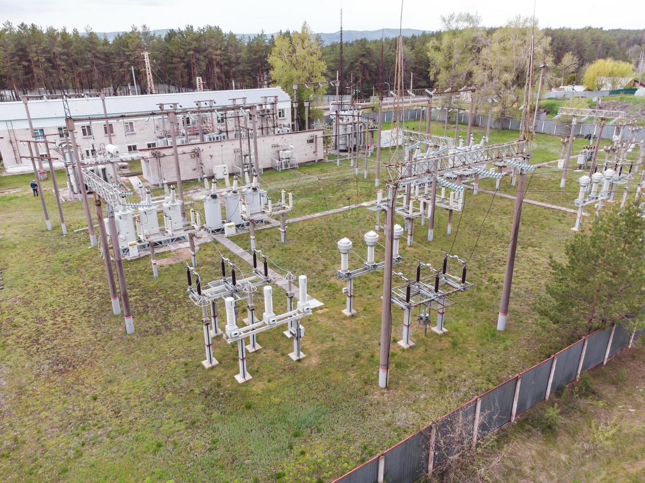 Aerial view of old rural high-voltage electrical railways substation. photo