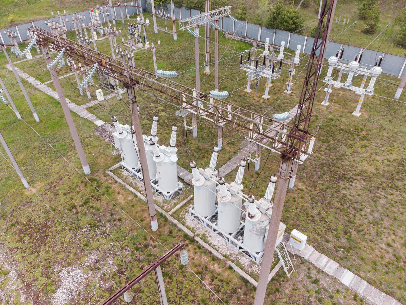 Aerial view of old rural high-voltage electrical railways substation. photo