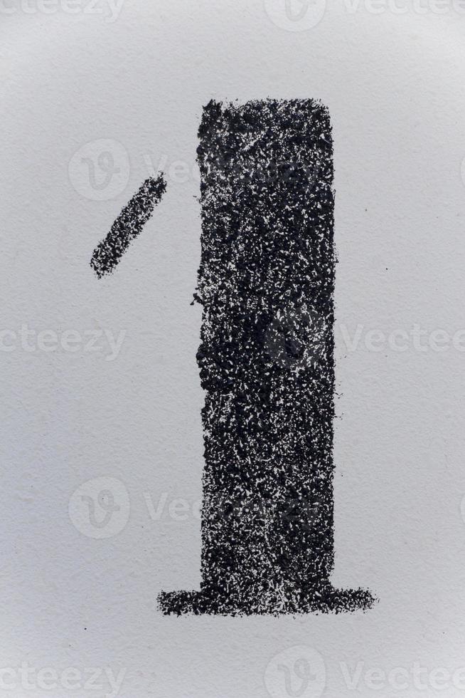 stencil number one painted on white backdrop, number one, number 1