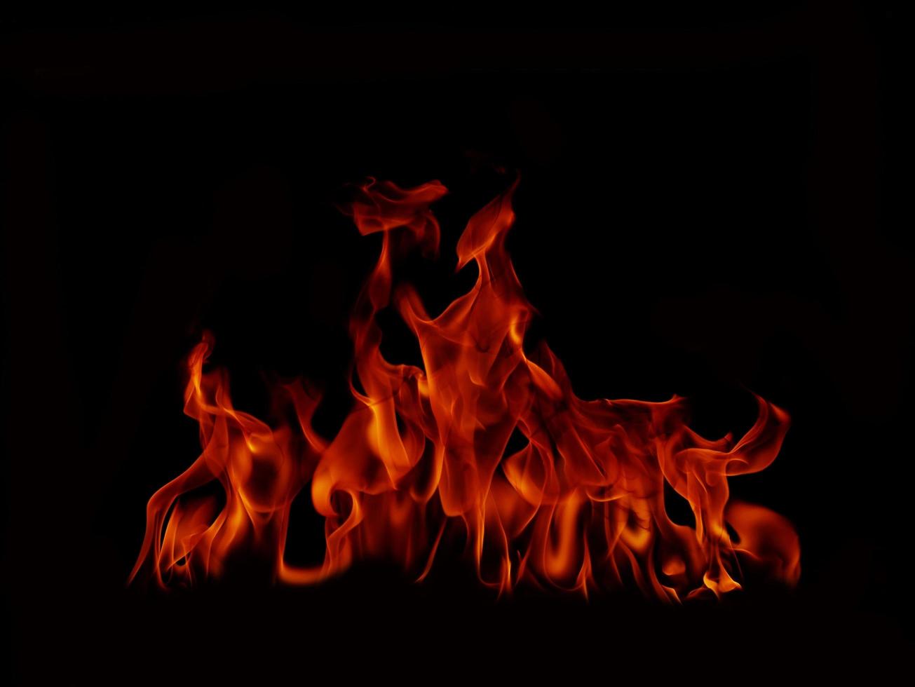 Flame Flame Texture For Strange Shape Fire Background Flame meat that is burned from the stove or from cooking. danger feeling abstract black background Suitable for banners or advertisements. photo