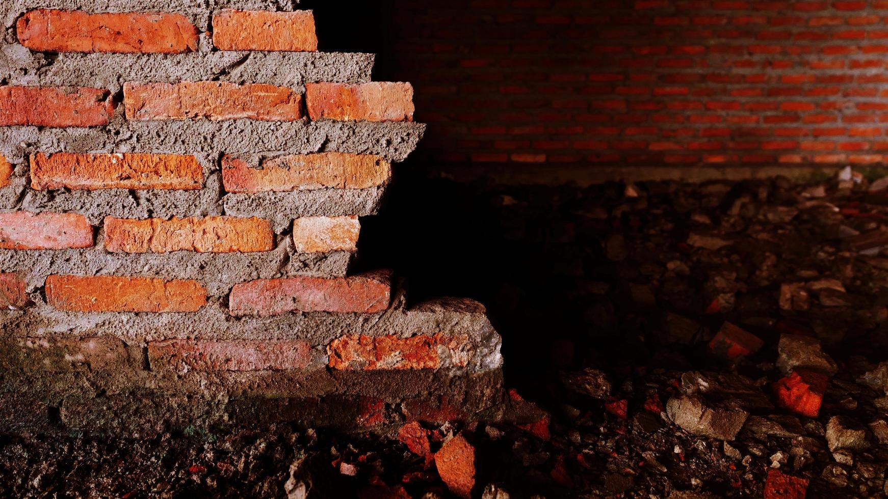 Unconventional building site The masonry was neglected, irresponsible, not progressing, only half finished. Some parts, the walls had rough surfaces. photo
