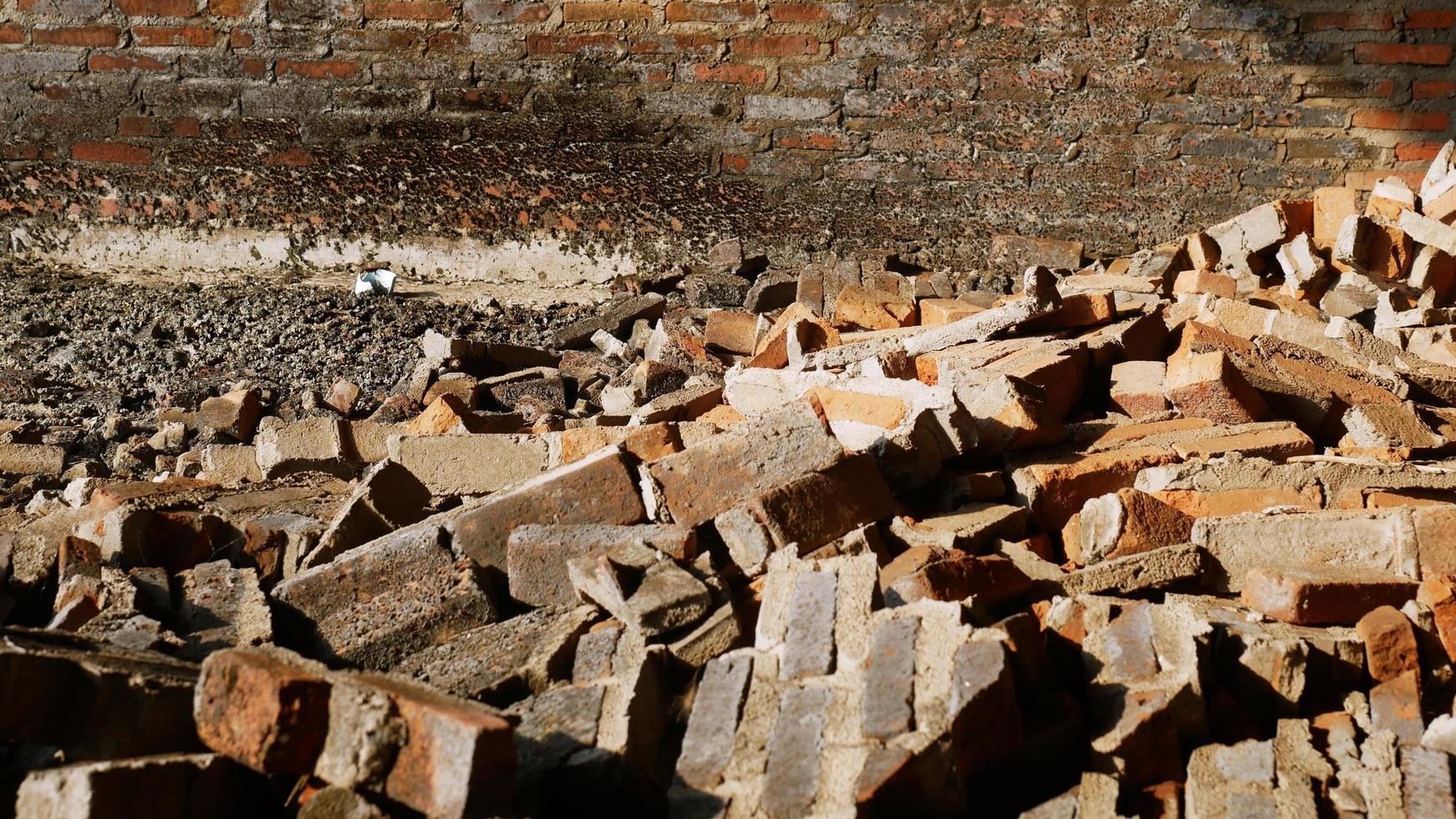 Close-up of the rubble of an industrial building collapsing into a pile of concrete and brick. and the jagged debris caused by the failure of the engineers at the abandoned construction. photo