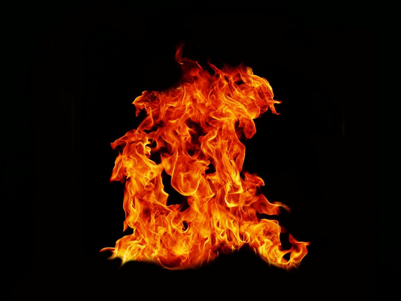 Flame meat that burns from a furnace or from cooking. dangerous feeling abstract black background .Suitable for banners or advertisements photo