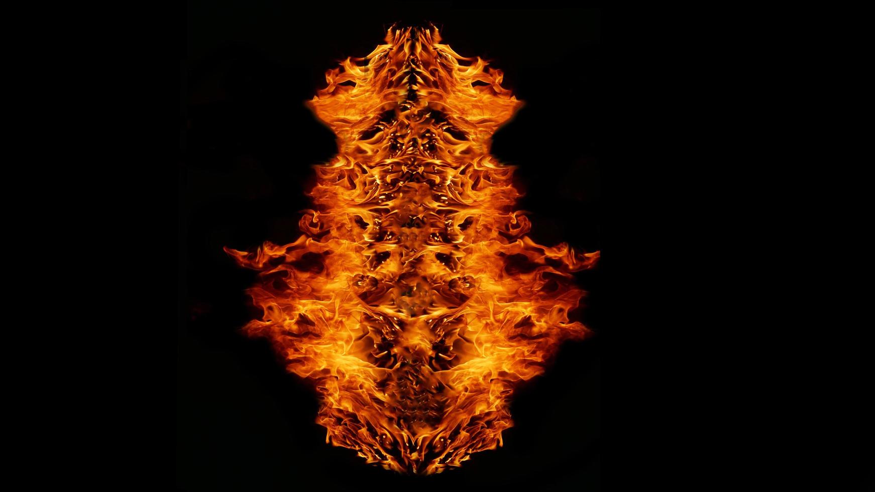 Flame Flame Texture For Strange Shape Fire Background Flame meat that is burned from the stove or from cooking. danger feeling abstract black background Suitable for banners or advertisements. photo