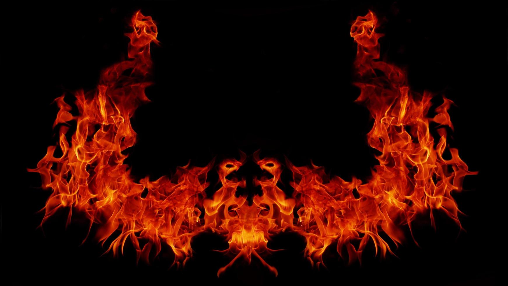 Flame Flame Texture For Strange Shape Fire Background Flame meat that is burned from the stove or from cooking. danger feeling abstract black background Suitable for banners or advertisements. photo