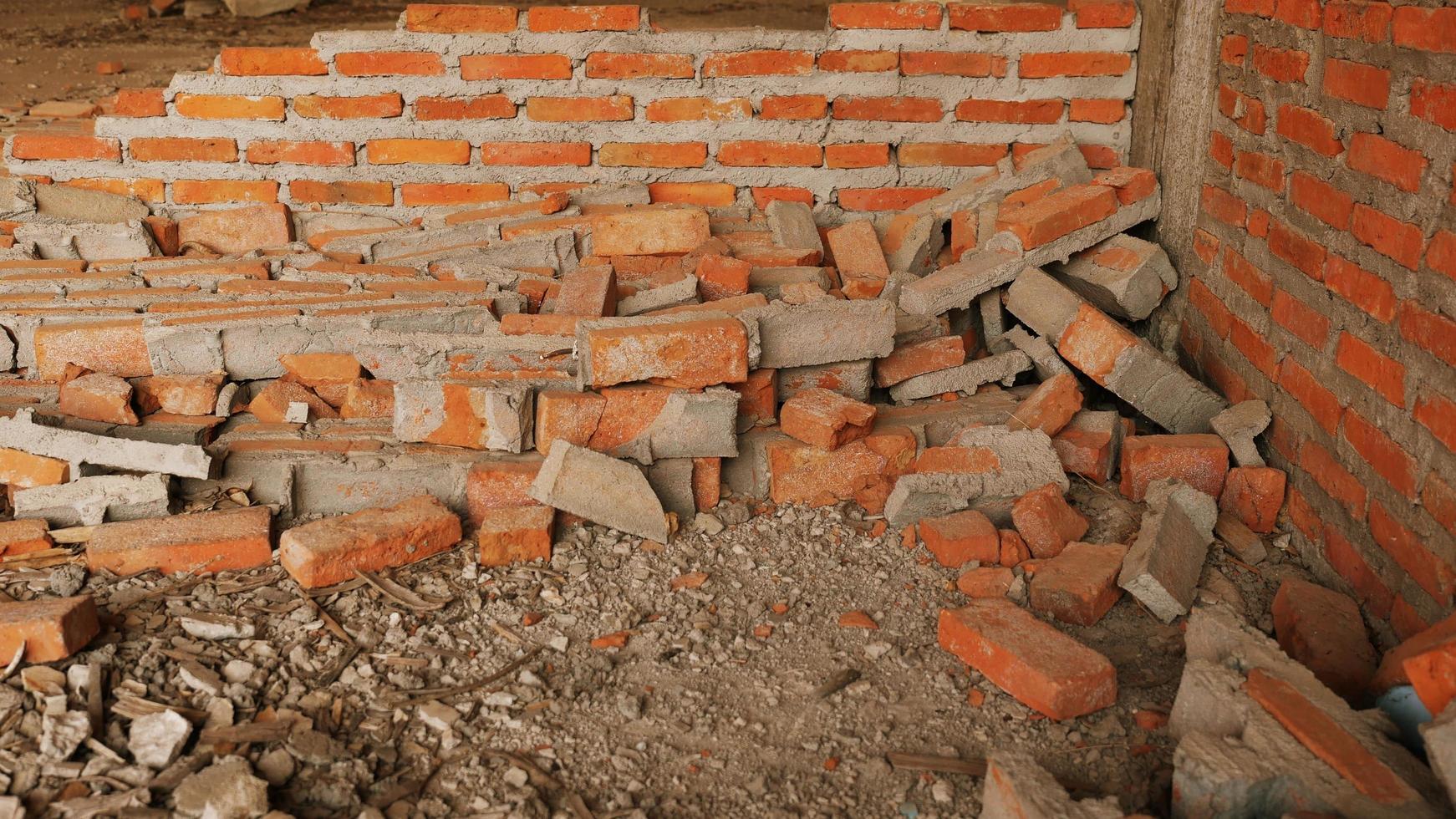 Close-up of the rubble of an industrial building collapsing into a pile of concrete and brick. and the jagged debris caused by the failure of the engineers at the abandoned construction. photo