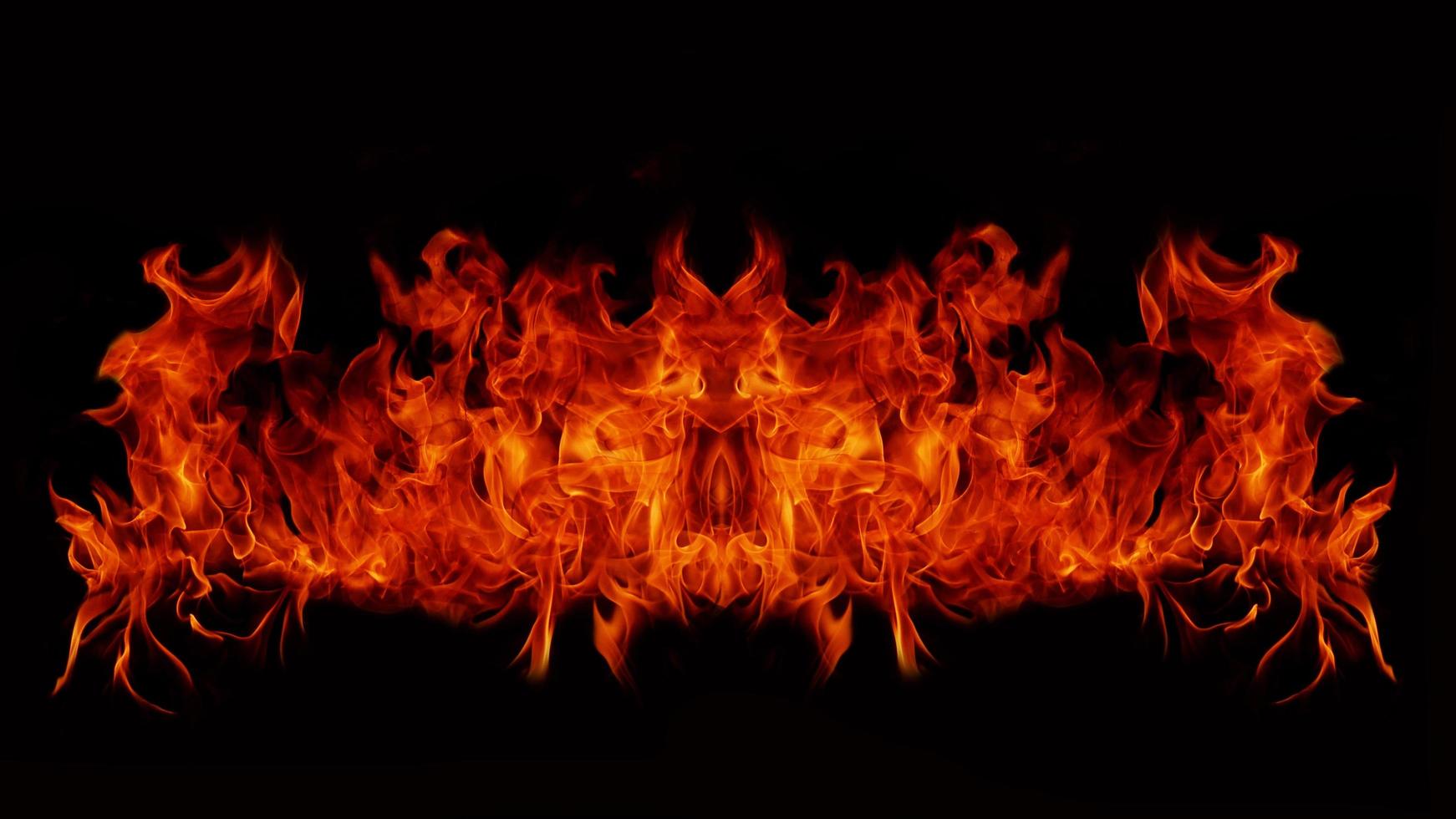 Flame Flame Texture For Strange Shape Fire Background Flame meat that is burned from the stove or from cooking. danger feeling abstract black background Suitable for banners or advertisements. photo