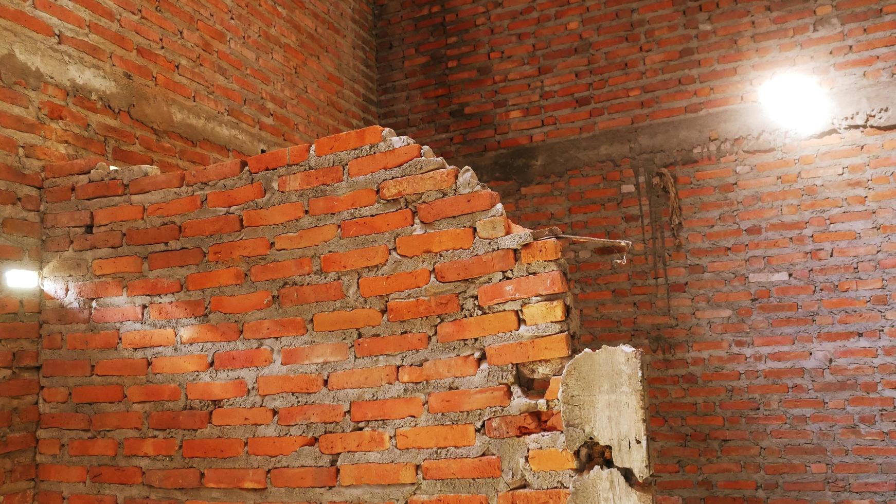 Unconventional building site The masonry was neglected, irresponsible, not progressing, only half finished. Some parts, the walls had rough surfaces. photo
