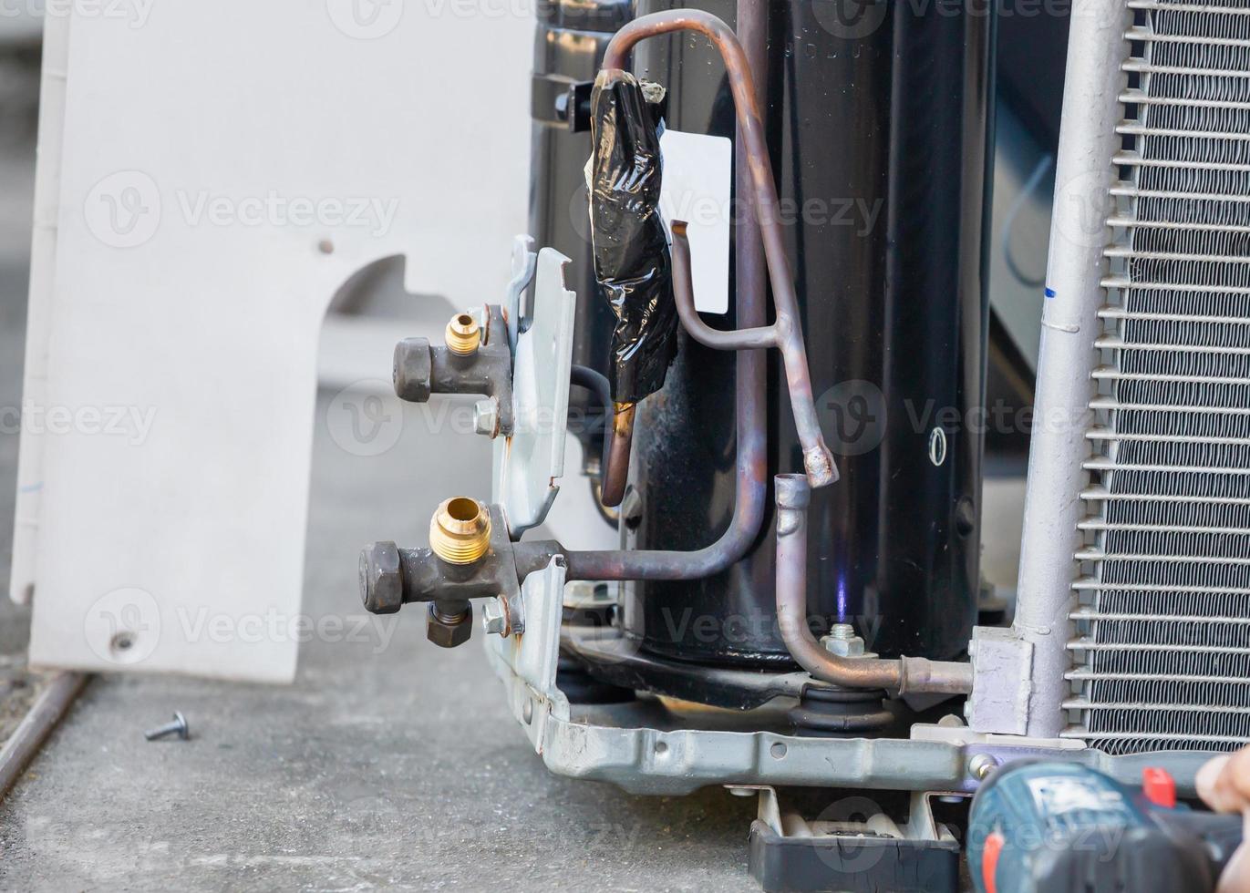 Close up of copper pipe HVAC air conditioning, Air Conditioning Repair use fuel gases and oxygen to weld or cut metals, Oxy-fuel welding and oxy-fuel cutting processes photo