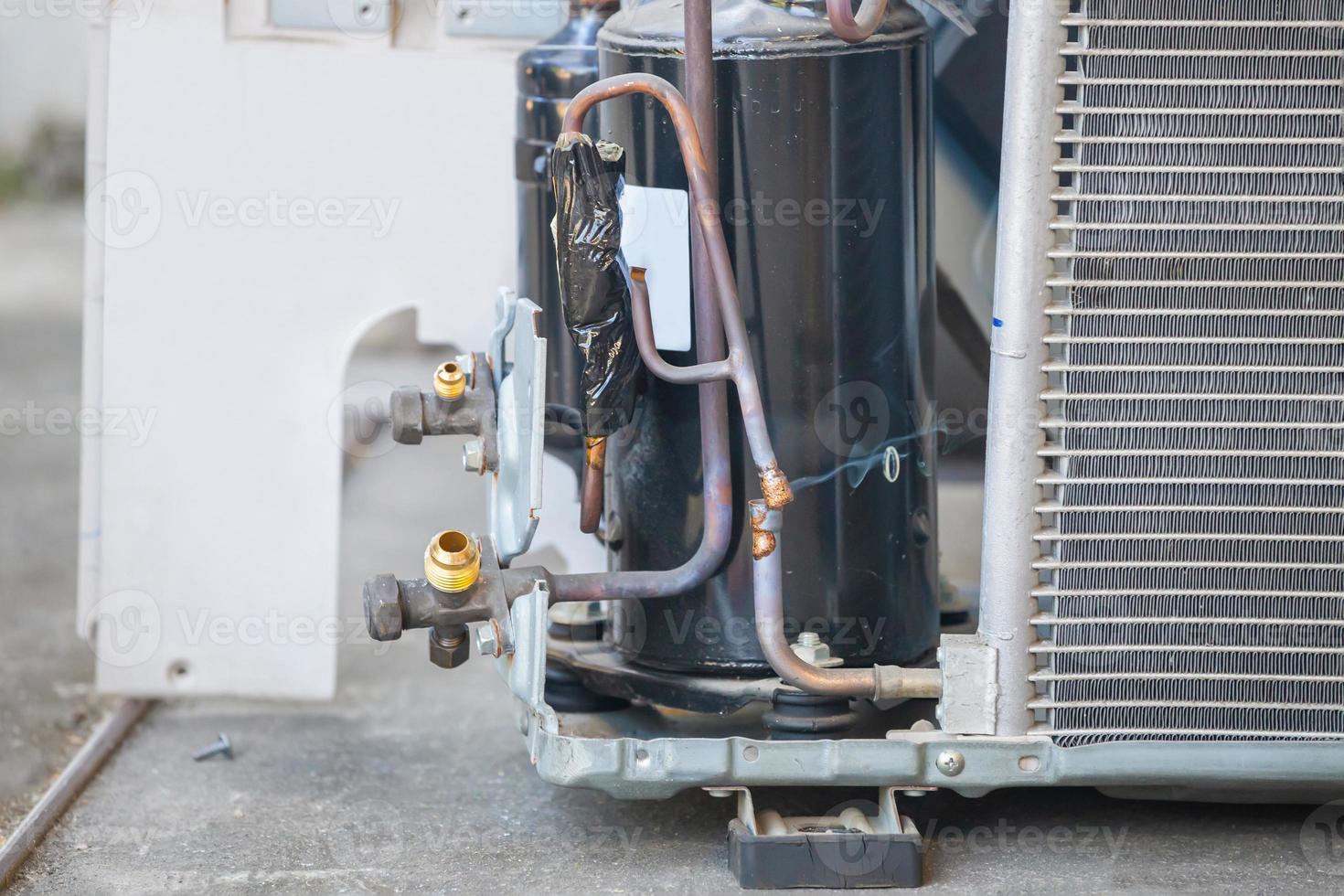 Close up of copper pipe HVAC air conditioning, Air Conditioning Repair use fuel gases and oxygen to weld or cut metals, Oxy-fuel welding and oxy-fuel cutting processes photo