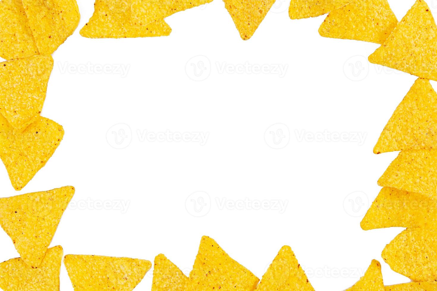 Nachos with cheese. Corn chips isolated on white background photo