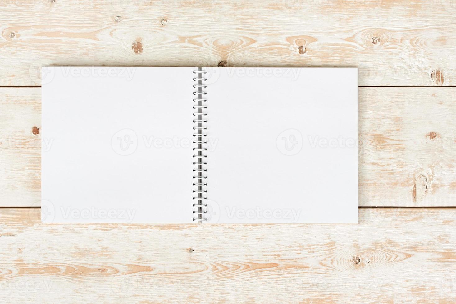 open notebook on the table photo