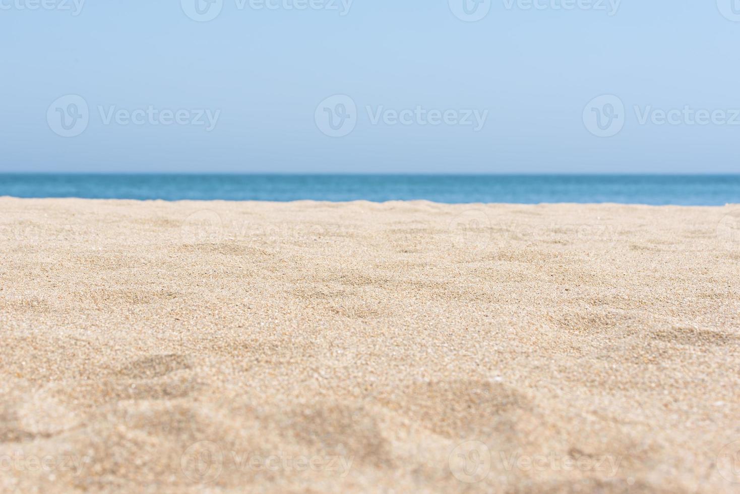 sea sand and blue sea background photo