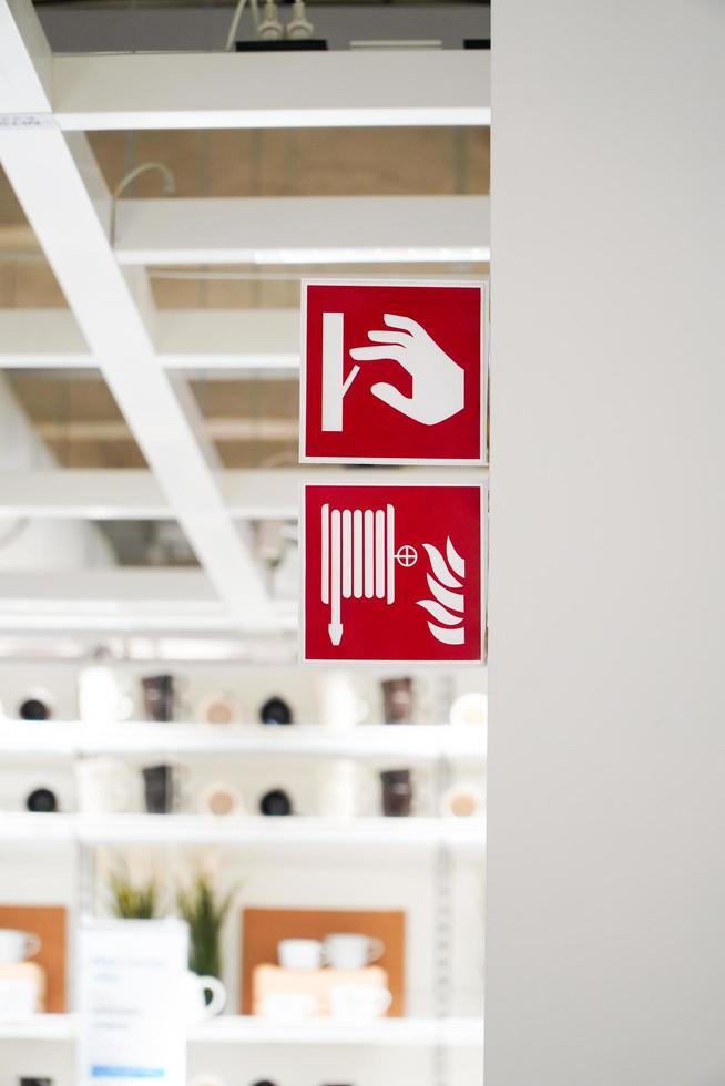 Signs indicating the installation of fire extinguishers and water lines photo