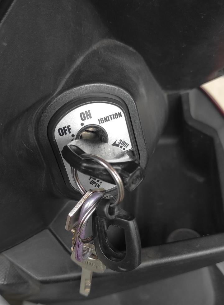 manual key to turn on or off the motorcycle photo