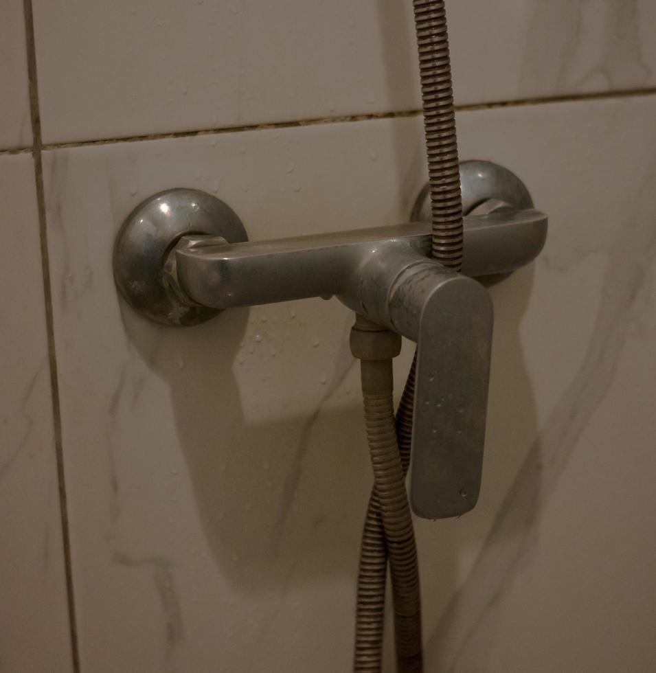 shower faucet branch water to divide hot and cold water photo