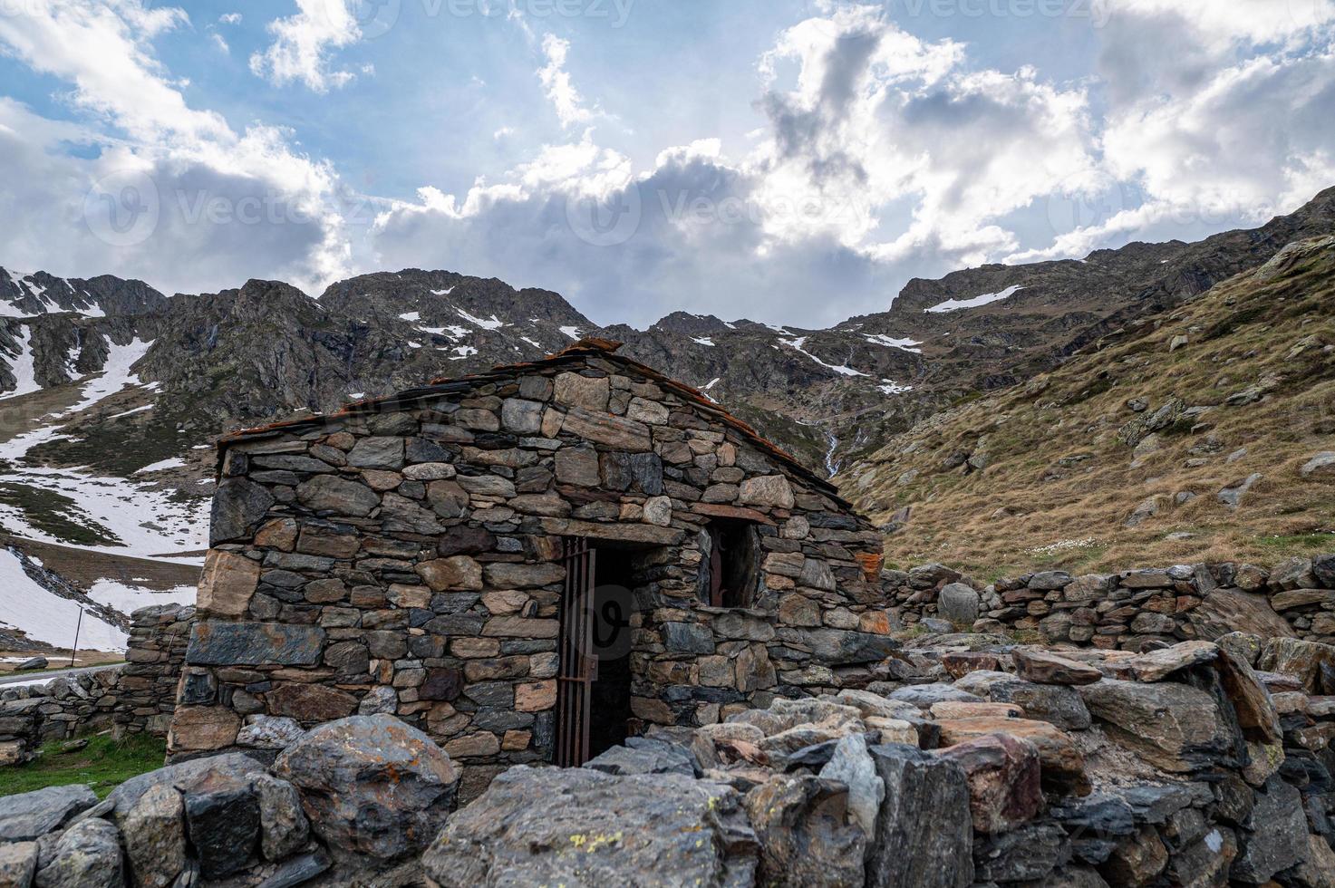 Rural cabin with the typical dry stone wall in Arcalis, Ordino in Andorra. photo